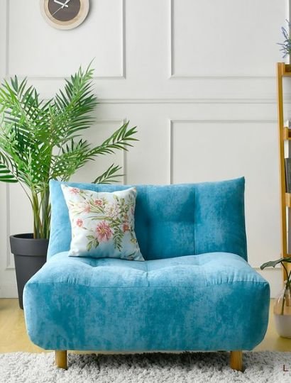 blue color single seater sofa