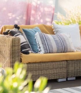 colorful pillows on outdoor sofa