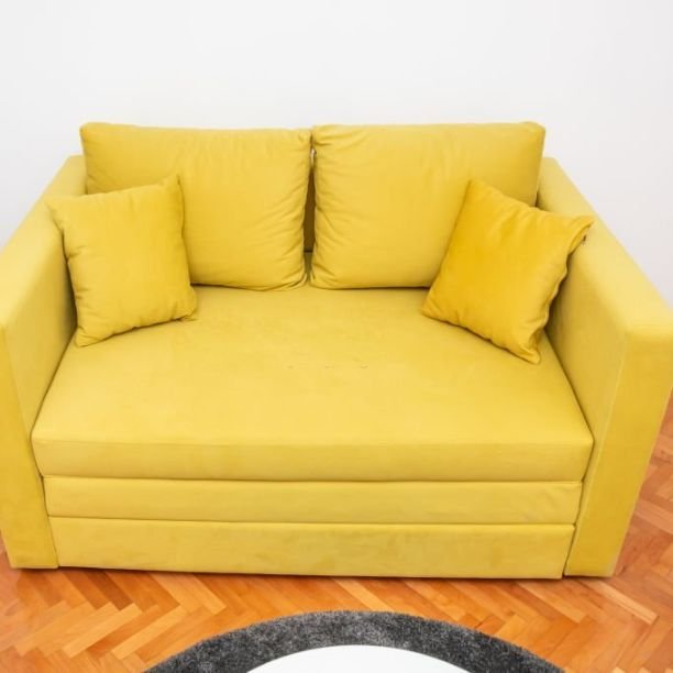 yellow color 2 seater sofa